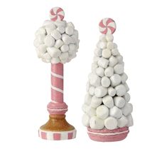 two pink and white candy canes on top of each other in front of a white background