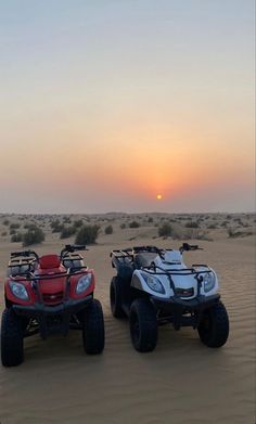 two four wheelers in the desert at sunset