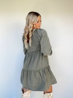 This Olive It Babydoll Dress is your ideal fashion piece this season. Crafted in a tiered, soft, and comfortable design, its mini fit and babydoll silhouette will keep you looking chic and stylish. Boasting a unique back tie detail and mineral wash, it's perfect to wear for a Thanksgiving dinner with the family, a brunch date with friends, or any special occasion. This dress is warm, long-sleeved, comfortable, and super versatile, making it perfect for any fall or winter occasion. Stay trendy an Cotton Tiered Mini Dress For Day Out, Cotton Mini Tiered Dress For Brunch, Chic Tiered Cotton Mini Dress, Cotton Mini Length Tiered Dress For Brunch, Fall Cotton Mini Dress With Ruffle Hem, Chic Cotton Tiered Mini Dress, Flowy Tiered Cotton Dress With Ruffle Hem, Casual Tiered Maxi Dress For Day Out, Chic Cotton Tiered Dress