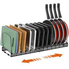 a rack that has some plates and knives in it