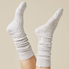 Escape into pure bliss with our plush slouch socks and experience unrivaled comfort as you sink your feet into their opulent softness. Enhanced with non-slip grippers, these socks offer improved mobility and safety. Our Marshmallow Slouch Socks provide a sensory treat that will leave you craving more. Relax and let the tension melt away as these socks envelop you in sumptuous softness. Treat your feet to lavish comfort; they deserve it. Cozy Soft Socks For Loungewear, Super Soft Comfortable Cream Socks, Comfortable Super Soft Cream Socks, Cozy Socks With Soft Texture And Snug Fit, Soft Cozy Fit Socks For Loungewear, Cozy Super Soft Cream Socks, Cozy Snug Socks For Loungewear, Comfortable Snug Socks For Loungewear, Comfortable Cozy Fit Socks