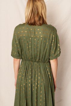 Be the life of the party with the Sofia Maxi Dress! This kimono sleeve lurex dress features a stunning green and gold color palette, with an asymmetrical hem that adds a touch of whimsy to your outfit. Perfect for a fun and playful night out. Green Midi Dress For Party Season, Green Short Sleeve Maxi Dress For Party, Chic Festive Gold Dress, Chic Gold Festive Dress, Gold V-neck Dress For Festive Occasions, Olive Maxi Dress For Party, Green V-neck Dress For Festive Season, Green V-neck Dress For Festive Occasions, Festive Green V-neck Dress