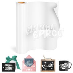 a large roll of white paper next to two mugs and a sign that says happy holidays