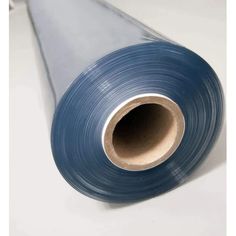 a roll of blue plastic film sitting on top of a table