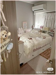 a bed room with a neatly made bed and teddy bears