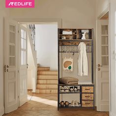 an open closet with baskets and shoes on the shelves next to it, in front of a staircase