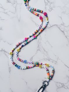 Fun and happy lanyard perfect for teachers or nurses. Multicolor Personalized Lanyards With Round Beads, Personalized Multicolor Lanyards With Round Beads, Trendy Multicolor Lanyards For Gifts, Trendy Multicolor Lanyards As Gifts, Teacher Lanyard Ideas, Beaded Lanyards Diy, Clay Bead Lanyard, Beaded Keyrings, Teacher Lanyard Beaded