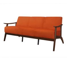 an orange couch sitting on top of a wooden frame