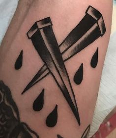 a black and white photo of a tattoo with a knife in the middle of it