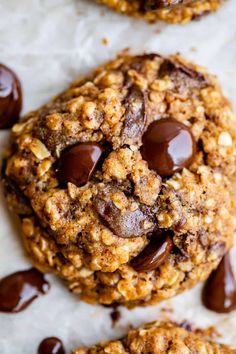 cookies with chocolate chips and almonds on parchment paper