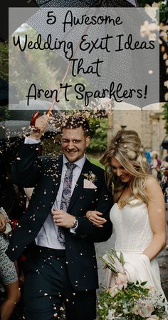 a bride and groom are walking through confetti