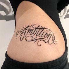 a woman's stomach with the word annition written in cursive writing