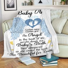 a blanket with an angel's footprints on it and the words baby al written in blue