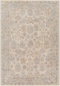 an area rug with various colors and patterns on the ground, including beiges, blue,