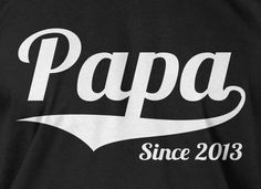 a black shirt with the words papa since 2013 printed on it