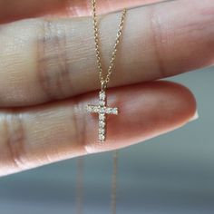 "This cross necklace is very small. I made it thinking about the mustard seed Jesus talked about in the Bible. He said in Matthew 13:31-32 He put another parable before them, saying, \"The kingdom of heaven is like a grain of mustard seed that a man took and sowed in his field. It is the smallest of all seeds, but when it has grown it is larger than all the garden plants and becomes a tree, so that the birds of the air come and make nests in its branches.\" So let our faith be like the mustard s Cross Necklace Simple, Dainty Cross Necklace, Diamond Cross Necklace, The Kingdom Of Heaven, Cross Jewelry Necklace, Dainty Necklaces, Cross Necklaces, Necklace Cross, Gold Cross Necklace