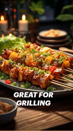 a plate full of food with skewers on it and the words great for grilling