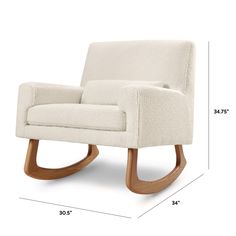 a white rocking chair with measurements for the seat