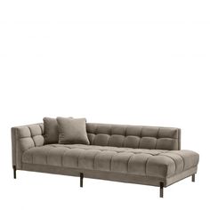 a gray couch with two pillows on it