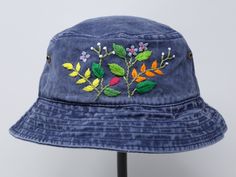 Item: mushroom embroidered bucket hat Material: 100% cotton Size: one size fits most Embroidery: hand made with acrylic thread Free first class shipping, upgradable priority mail service. 30 days return policy, feel confident at your purchase! Embroidered Adjustable 5-panel Hat, Adjustable Embroidered 5-panel Hat, Spring Hat With Embroidered Logo And Short Brim, Casual Embroidered Adjustable Bucket Hat, Spring Wide Brim Bucket Hat With Embroidered Logo, Casual Embroidered Bucket Hat, Casual Embroidered 5-panel Hat, Embroidered Bucket Hat For Spring, Embroidered Adjustable Bucket Hat