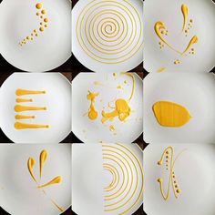 several plates with yellow designs on them