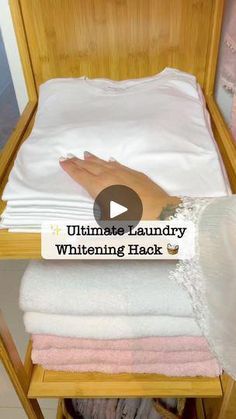 someone is unpacking white linens in a wooden box with the words ultimate laundry whitening hack on it