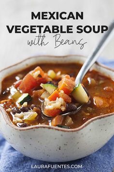 mexican vegetable soup with beans in a white bowl