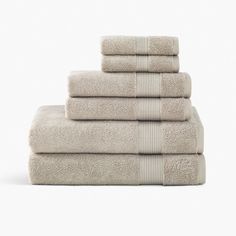 six towels stacked on top of each other