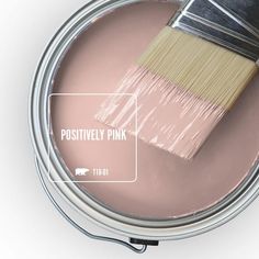 a close up of a paint can with a brush in it and the words sunset drive