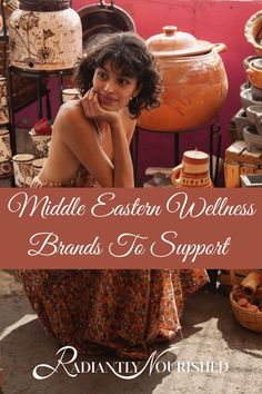 a woman sitting on the ground in front of pots and pans with text that reads middle eastern wellness brands to support