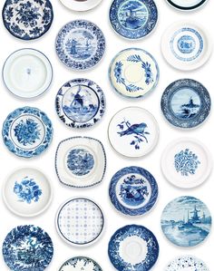 blue and white plates stacked on top of each other in different sizes, shapes and colors