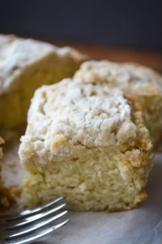 a close up of a piece of cake on a plate with a fork