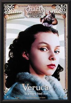 a girl with a cat on top of her head in front of a poster for the movie veruca