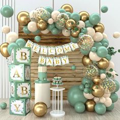 a welcome baby sign surrounded by balloons and decorations