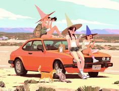 three women sitting on top of an orange car in the desert with cats and dogs