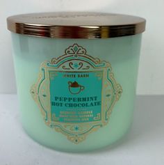 a glass jar with a label on it that says peppermint hot chocolate in front of a white background