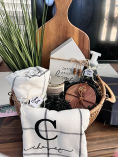 a basket filled with items sitting on top of a wooden table