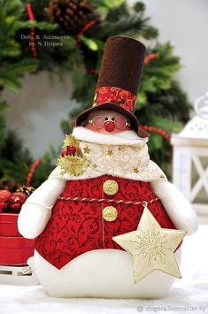 a snowman is dressed in red and white