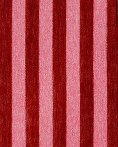 red and pink striped fabric with vertical stripes