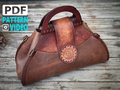 a brown leather handbag sitting on top of a wooden floor next to pine cones