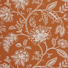 an orange and white floral print fabric