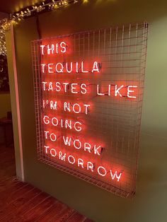 a neon sign that says this tequila tastes like i'm not going to work tomorrow