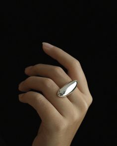 Featuring a sculptural elongated form, this ring is a statement of elegance. It combines the graceful aesthetics of liquid and solid into one stunning piece. Together with the Innes Elongated Earrings, pair with our classic Clarke Button Up for elevated style in a timeless look. Available in gold-plated / silver-plated alloy Free size Measurements:Inner diameter 17.5mm / size 7 1/4 Full priced items purchased with a promotional or discount code are not eligible for a refund but may be eligible f Sculptural Jewelry, Layered Rings, Bold Rings, Minimal Jewelry, Jewelry Photography, Classic Ring, Jewelry Inspo, Minimalist Jewelry, Modern Jewelry