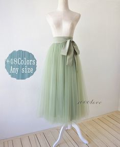 ~~~KNOW MORE ABOUT THE SKIRT !!!! ~~~~~ The picture show color is pea green ,color number 301, the skirt is not include the sash~~~ When order,please leave a message which color you needif not ,we will default the picture color! ~~~ Our skirt have 3 layer high-quality layers of softest tulle and one lining.The item is make with knee length,we always use chiffon lining, if you have special need,please contact us!☆☆☆MORE COLORS CHOOSE !Other color linkhttps://www.etsy.com/listing/186689692/adult-w Elegant Summer Tulle Skirt Fabric, Green Tulle Skirt Dress For Summer, Fitted Tulle Fabric For Summer Bridesmaid, Summer Wedding Tulle Fabric, Green Wedding Skirt For Spring, Green Spring Wedding Skirt, Green Summer Wedding Skirt, Spring Wedding Green Skirt, Elegant Green Tulle Skirt