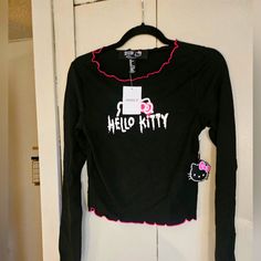 Hello Kitty/Forever 21. Black Long Sleeve Tee With Pink Ruffle Trimming Size M . New Never Worn Cheetah Print Shirts, White Stripes Shirt, Cold Shoulder Long Sleeve, Thermal Long Sleeve, Ruffle Long Sleeve, Shoulder Shirts, Pullover Shirt, Grey Long Sleeve, Cozy Knits