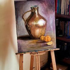 an oil painting of a copper pitcher and peeled tangerines on a easel