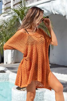 Get ready to slay the beach style game with this Sunsets Ombre Oversized Knit Sweater! Effortlessly cool and cute, this knit sweater will keep you cover-up and stylish as you watch the sun go down on the shore. Perfect for layering or lounging, it's a must-have for your beach wardrobe! Size Guide: Model is 5’8” tall, and has a 34.2” bust, 24.9”waist, & 37.7” hips. She is wearing a S / US 4 / AU 8. This sweater is true to size. Material: 100% Rayon. Key Features: V-Neckline. Short sleeve. Coverup. Crochet Perforated Knit. Not lined. Oversized fit. Maternity friendly. Care Instructions: Machine wash / Cold hand wash Beach Wardrobe, Oversized Knit Sweater, Cutout Sweater, Oversize Knit, Oversized Knitted Sweaters, Daily Dress, Beach Covers, Brunei, Beach Style