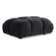 three black cushions sitting on top of each other