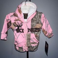 New Kings Pink Camo Jacket Zip Up Infant 3-6 Months Girl Camping Baby Hunting Perfect New Condition No Flaws Size 3-6 Months Perfect For Camping Or Hunting With Dad Measures Approximately: 10" Across Underarms 8.5“ Sleeves 12“ Overall Length, Shoulder To Hem I Ship Daily From A Non-Smoking Home, Have All 5 Star Ratings & 100+ Love Notes. I Am Also A Posh Ambassador 2!! Baby Hunting, Pink Camo Jacket, Girl Camping, Camping Baby, Cozy Camping, Hunting Baby, Camping With A Baby, Camo And Pink, Camo Baby Stuff