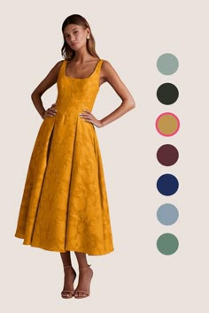 a woman in a yellow dress with different colors